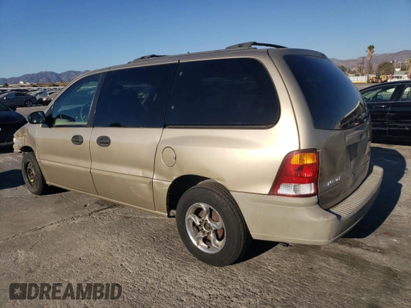 1999 Ford Windstar LX with VIN 2FMZA5140XBB06892, listed as a Copart auction lot 81584994 with 138,550 mi miles and Salvage title. Bid and sale history available at DreamBid. Image 2.