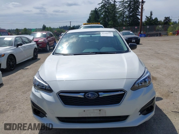 2019 Subaru Impreza with VIN 4S3GTAA63K3733496, listed as a IAAI auction lot 42500553 with 65,708 mi miles and . Bid and sale history available at DreamBid. Image 13.