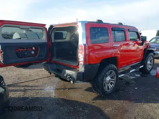 2009 Hummer H3 SUV Alpha with VIN 5GTEN13L398145561, listed as a IAAI auction lot 41232458 with 153,543 mi miles. Bid and sale history available at carsss.com. Image 4.