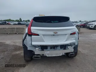 2023 Cadillac XT4 FWD Premium Luxury with VIN 1GYFZCR49PF225817, listed as a IAAI auction lot 42408494 with 5,977 mi miles and . Bid and sale history available at DreamBid. Image 6.