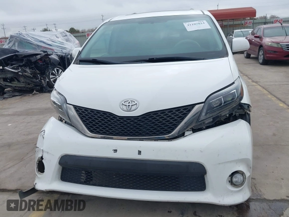 2012 Toyota Sienna SE with VIN 5TDXK3DC8CS276491, listed as a IAAI auction lot 41107014 with 96,266 mi miles. Bid and sale history available at carsss.com. Image 12.