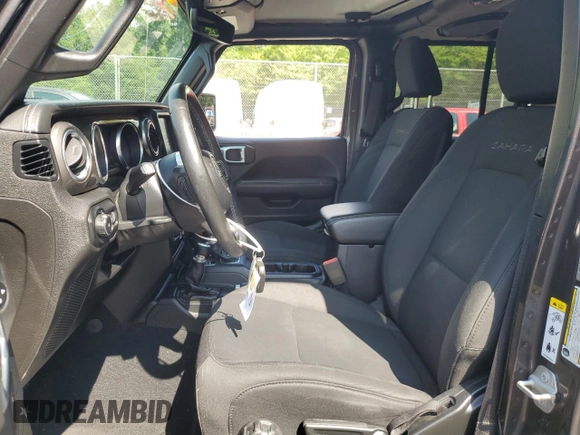 2018 Jeep Wrangler Unlimited Sahara with VIN 1C4HJXEGXJW229881, listed as a Copart auction lot 58762775 with 82,470 mi miles and Salvage title. Bid and sale history available at DreamBid. Image 7.
