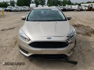 2017 Ford Focus SE with VIN 1FADP3F24HL291691, listed as a Copart auction lot 60596685 with 111,604 mi miles and Clean title. Bid and sale history available at DreamBid. Image 5.