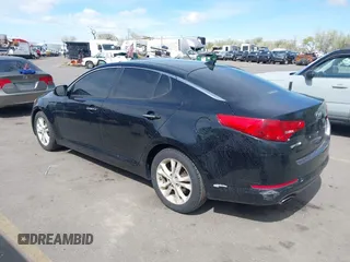 2013 Kia Optima EX with VIN 5XXGN4A79DG174558, listed as a IAAI auction lot 42078646 with 163,161 mi miles. Bid and sale history available at carsss.com. Image 3.