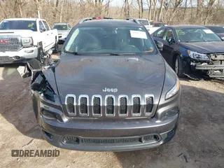 2016 Jeep Cherokee Latitude with VIN 1C4PJMCS7GW246423, listed as a IAAI auction lot 41805421 with 60,880 mi miles and . Bid and sale history available at carsss.com. Image 17.