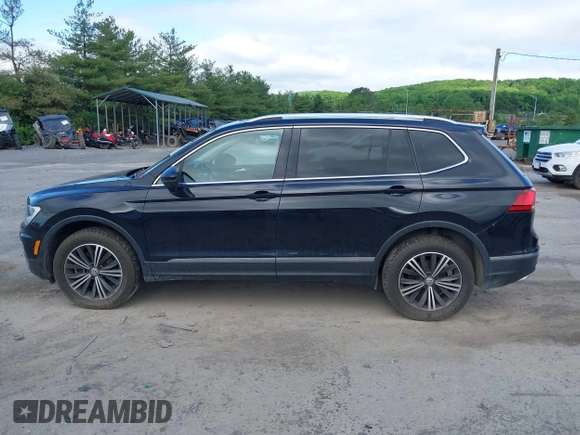 2018 Volkswagen Tiguan SEL z VIN 3VV2B7AXXJM145781, wystawiony jako IAAI lot #42273176 z przebiegiem 86 610 mil mil oraz . Historia ofert i sprzedaży dostępna na DreamBid. Obrazek 15.