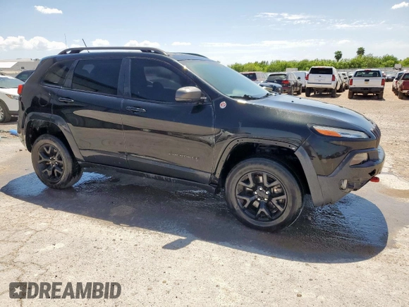 2015 Jeep Cherokee Trailhawk с VIN 1C4PJMBS2FW504041, выставлен на аукционе Copart как лот 66968245 с пробегом 129 312 миль миль и Чистый • Clean title. История ставок и продаж доступна на DreamBid. Изображение 4.