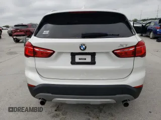 2018 BMW X1 sDrive28i with VIN WBXHU7C3XJ5H44902, listed as a Copart auction lot 46373033 with 49,520 mi miles. Bid and sale history available at carsss.com. Image 6.