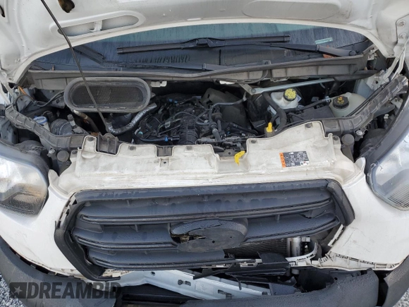 2020 Ford Transit Cargo with VIN 1FTBF4XG3LKB70573, listed as a Copart auction lot 77039474 with 131,873 mi miles and Salvage Title. Bid and sale history available at DreamBid. Image 13.