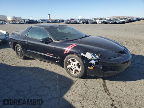 1999 Pontiac Firebird Firebird z VIN 2G2FS22K6X2208489, wystawiony jako Copart lot #79930994 z przebiegiem 181 964 mil mil oraz Czysty tytuł • Clean title. Historia ofert i sprzedaży dostępna na DreamBid. Obrazek 4.