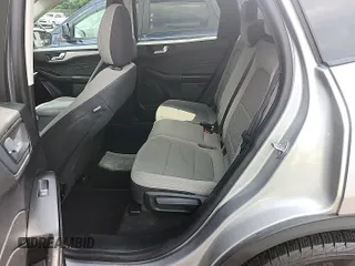 2021 Ford Escape SE with VIN 1FMCU9G60MUA42971, listed as a IAAI auction lot 42741185 with 70,686 mi miles and . Bid and sale history available at DreamBid. Image 1.