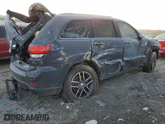 2017 Jeep Grand Cherokee Trailhawk with VIN 1C4RJFLT0HC694583, listed as a Copart auction lot 84421734 with 116,772 mi miles and Salvage title. Bid and sale history available at DreamBid. Image 3.