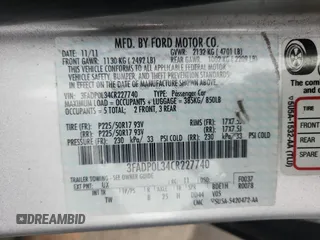 2012 Ford Fusion Hybrid z VIN 3FADP0L34CR227740, wystawiony jako Copart lot #64989475 z przebiegiem 134 862 mil mil oraz Szkoda całkowita • Salvage title. Historia ofert i sprzedaży dostępna na DreamBid. Obrazek 13.