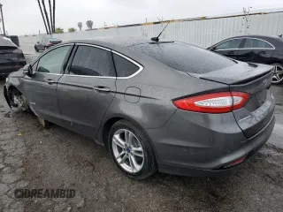 2016 Ford Fusion Titanium Hybrid z VIN 3FA6P0RU5GR356987, wystawiony jako Copart lot #48211775 z przebiegiem 145 192 mil mil oraz Szkoda całkowita • Salvage title. Historia ofert i sprzedaży dostępna na DreamBid. Obrazek 2.