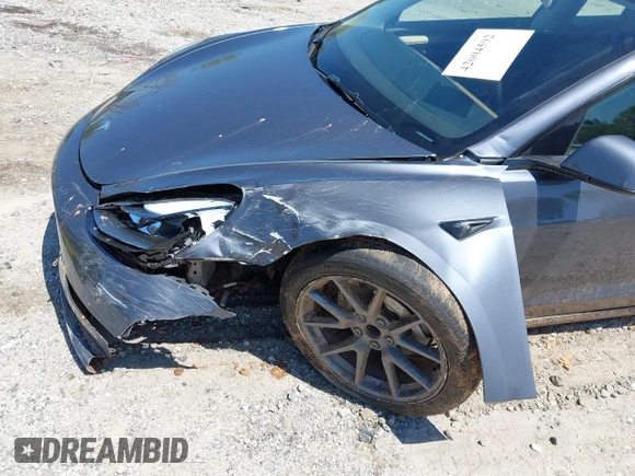 2023 Tesla Model 3 z VIN 5YJ3E1EA0PF655244, wystawiony jako IAAI lot #42004592 z przebiegiem 54 860 mil mil oraz . Historia ofert i sprzedaży dostępna na DreamBid. Obrazek 6.