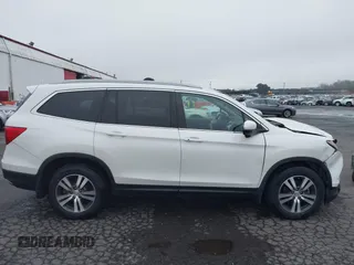2016 Honda Pilot EX-L with VIN 5FNYF6H78GB092265, listed as a IAAI auction lot 41312700 with 52,101 mi miles. Bid and sale history available at carsss.com. Image 13.