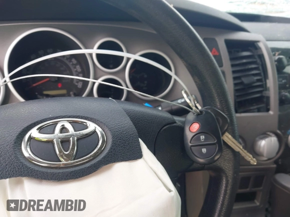 2012 Toyota Tundra with VIN 5TFUW5F16CX225421, listed as a IAAI auction lot 42210783 with 207,025 mi miles and . Bid and sale history available at DreamBid. Image 11.