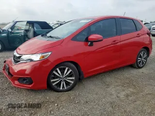 2018 Honda Fit EX-L with VIN 3HGGK5H97JM706911, listed as a Copart auction lot 57121595 with 117,375 mi miles and Salvage title. Bid and sale history available at DreamBid. Image 1.