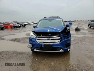 2018 Ford Escape Titanium with VIN 1FMCU9J98JUB31234, listed as a Copart auction lot 58817705 with 140,183 mi miles and Salvage title. Bid and sale history available at DreamBid. Image 14.