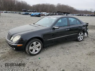 2005 Mercedes-Benz E 5.0L with VIN WDBUF70J45A645154, listed as a Copart auction lot 82883524 with 134,088 mi miles and Salvage Title. Bid and sale history available at carsss.com. Image 1.