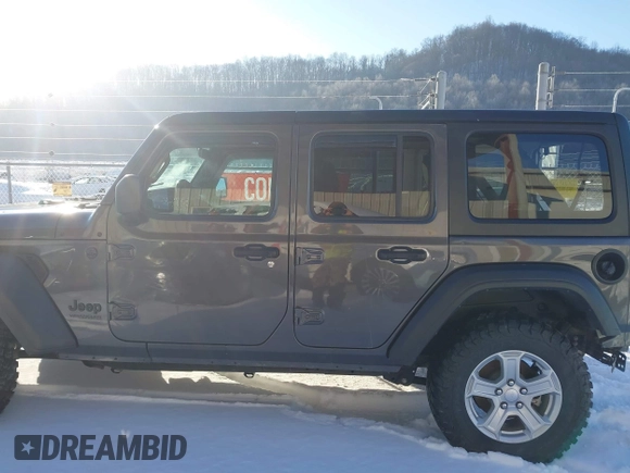 2022 Jeep Wrangler Unlimited Sport with VIN 1C4HJXDG5NW157317, listed as a IAAI auction lot 41374590 with 67,632 mi miles and . Bid and sale history available at DreamBid. Image 15.