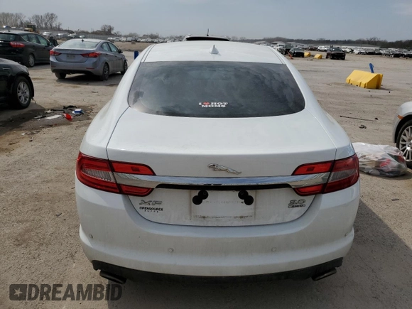 2013 Jaguar XF SC with VIN SAJWJ0EF3D8U08568, listed as a Copart auction lot 51001015 with 131,108 mi miles and Salvage Title. Bid and sale history available at DreamBid. Image 6.