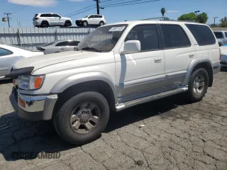 1998 Toyota 4Runner with VIN JT3GN87R4W0077101, listed as a Copart auction lot 63057125 with 267,972 mi miles and Salvage title. Bid and sale history available at DreamBid. Image 1.