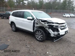 2022 Honda Pilot EX-L with VIN 5FNYF6H54NB020832, listed as a IAAI auction lot 40916277 with 58,441 mi miles. Bid and sale history available at carsss.com. Image 1.