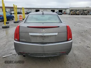 2012 Cadillac CTS Luxury z VIN 1G6DG5E54C0142423, wystawiony jako Copart lot #44146205 z przebiegiem 174 022 mil mil oraz Szkody całkowita. Historia ofert i sprzedaży dostępna na DreamBid. Obrazek 6.