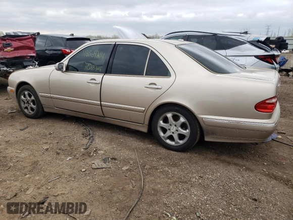 2002 Mercedes-Benz E-Class with VIN WDBJF65J12B463150, listed as a Copart auction lot 74434654 with 215,883 mi miles and Salvage Title. Bid and sale history available at carsss.com. Image 2.
