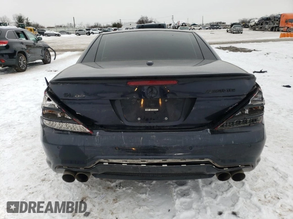 2009 Mercedes-Benz SL 550 with VIN WDBSK71F09F153162, listed as a Copart auction lot 88884365 with 155,973 mi miles and Salvage title. Bid and sale history available at DreamBid. Image 6.