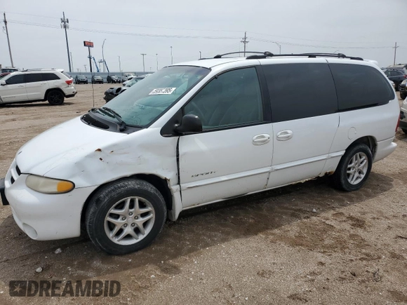 2000 Dodge Caravan SE with VIN 1B4GP44G7YB636078, listed as a Copart auction lot 59387395 with 184,916 mi miles and Salvage title. Bid and sale history available at DreamBid. Image 1.