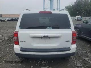 2016 Jeep Patriot Latitude with VIN 1C4NJRFB9GD586698, listed as a Copart auction lot 61131125 with 154,679 mi miles and Salvage title. Bid and sale history available at DreamBid. Image 6.