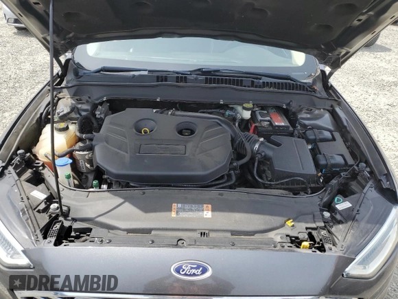2017 Ford Fusion Titanium z VIN 3FA6P0K95HR139060, wystawiony jako Copart lot #62200755 z przebiegiem 106 133 mil mil oraz Szkoda całkowita • Salvage title. Historia ofert i sprzedaży dostępna na DreamBid. Obrazek 11.