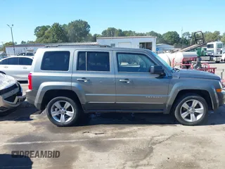 2013 Jeep Patriot Latitude with VIN 1C4NJPFB7DD254744, listed as a IAAI auction lot 40540820 with 129,465 mi miles and . Bid and sale history available at carsss.com. Image 13.