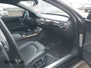 2015 Audi A8 L 4.0T with VIN WAU32AFD5FN026108, listed as a IAAI auction lot 41652860 with 148,253 mi miles. Bid and sale history available at carsss.com. Image 5.