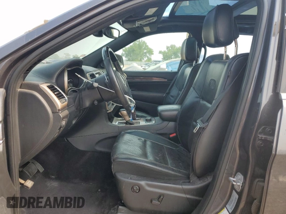 2017 Jeep Grand Cherokee Overland with VIN 1C4RJFCG0HC762612, listed as a Copart auction lot 57400095 with 122,702 mi miles and Salvage title. Bid and sale history available at DreamBid. Image 7.