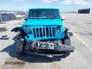 2017 Jeep Wrangler Unlimited Sahara with VIN 1C4BJWEG8HL655998, listed as a IAAI auction lot 41906919 with 100,350 mi miles and . Bid and sale history available at DreamBid. Image 13.