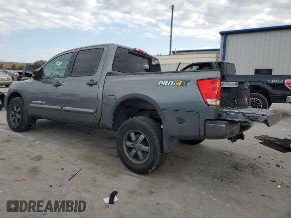 2015 Nissan Titan SV with VIN 1N6BA0ECXFN503651, listed as a Copart auction lot 88101695 with 120,649 mi miles and Salvage title. Bid and sale history available at DreamBid. Image 2.
