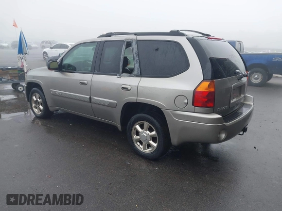 2002 GMC Envoy SLT with VIN 1GKDS13S322491528, listed as a IAAI auction lot 41482996 with 251,182 mi miles. Bid and sale history available at carsss.com. Image 3.