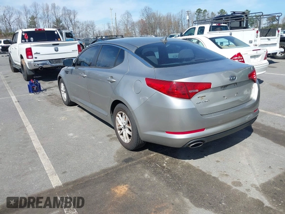 2011 Kia Optima LX with VIN KNAGM4A70B5081042, listed as a IAAI auction lot 41835721 with 203,609 mi miles and . Bid and sale history available at carsss.com. Image 3.