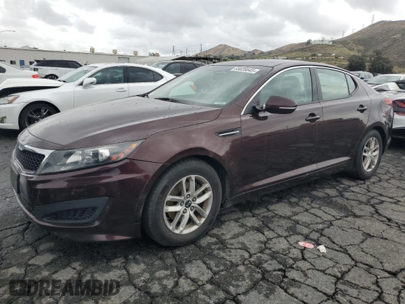 2011 Kia Optima LX z VIN KNAGM4A72B5116910, wystawiony jako Copart lot #55839845 z przebiegiem 187 943 mil mil oraz Szkoda całkowita • Salvage title. Historia ofert i sprzedaży dostępna na DreamBid. Obrazek 1.