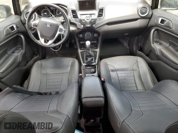 2014 Ford Fiesta Titanium z VIN 3FADP4FJXEM228098, wystawiony jako Copart lot #55173975 z przebiegiem 109 311 mil mil oraz Szkoda całkowita • Salvage title. Historia ofert i sprzedaży dostępna na DreamBid. Obrazek 8.