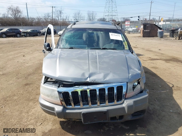 2002 Jeep Grand Cherokee Laredo with VIN 1J4GW48N42C188117, listed as a IAAI auction lot 41794232 with 1 mi miles. Bid and sale history available at carsss.com. Image 12.