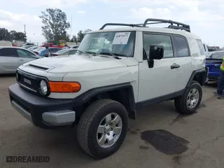 2014 Toyota FJ Cruiser with VIN JTEBU4BF7EK177741, listed as a IAAI auction lot 41871477 with 195,262 mi miles. Bid and sale history available at carsss.com. Image 2.