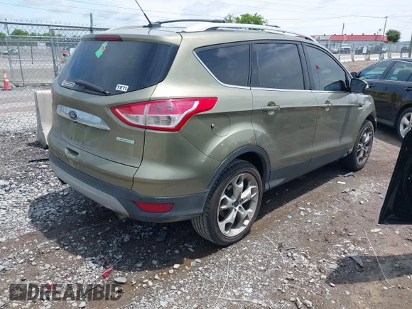 2014 Ford Escape Titanium с VIN 1FMCU0J93EUA92621, выставлен на аукционе IAAI как лот 42531195 с пробегом 170 423 миль миль и . История ставок и продаж доступна на DreamBid. Изображение 4.