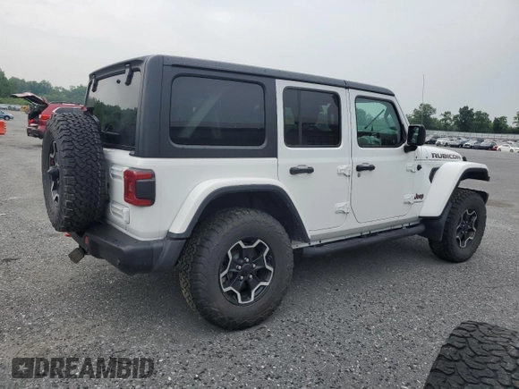 2023 Jeep Wrangler Rubicon with VIN 1C4JJXFM3PW585720, listed as a Copart auction lot 59776305 with 19,190 mi miles and Salvage title. Bid and sale history available at DreamBid. Image 3.