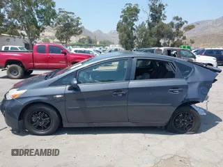 2015 Toyota Prius Four with VIN JTDKN3DU9F0473025, listed as a IAAI auction lot 42425733 with 124,196 mi miles and . Bid and sale history available at DreamBid. Image 14.