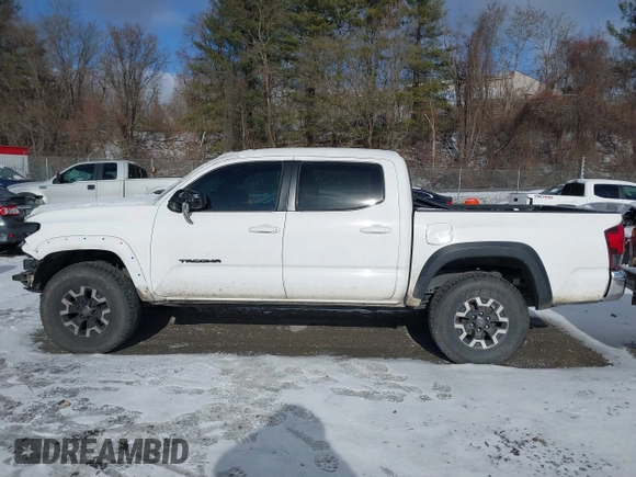 2019 Toyota Tacoma SR z VIN 5TFCZ5AN9KX178090, wystawiony jako IAAI lot #41155337 z przebiegiem 115 265 mil mil oraz . Historia ofert i sprzedaży dostępna na DreamBid. Obrazek 14.