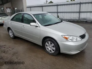 2004 Toyota Camry LE z VIN 4T1BE32K34U919799, wystawiony jako Copart lot #56546535 z przebiegiem 75 033 mil mil oraz Szkoda całkowita • Salvage title. Historia ofert i sprzedaży dostępna na DreamBid. Obrazek 4.